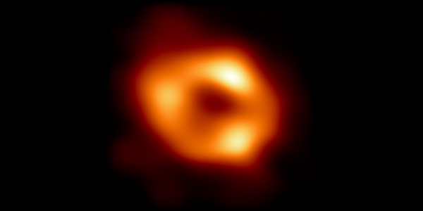 This is the first image of Sagittarius A* (or Sgr A* for short), the supermassive black hole at the centre of our galaxy.